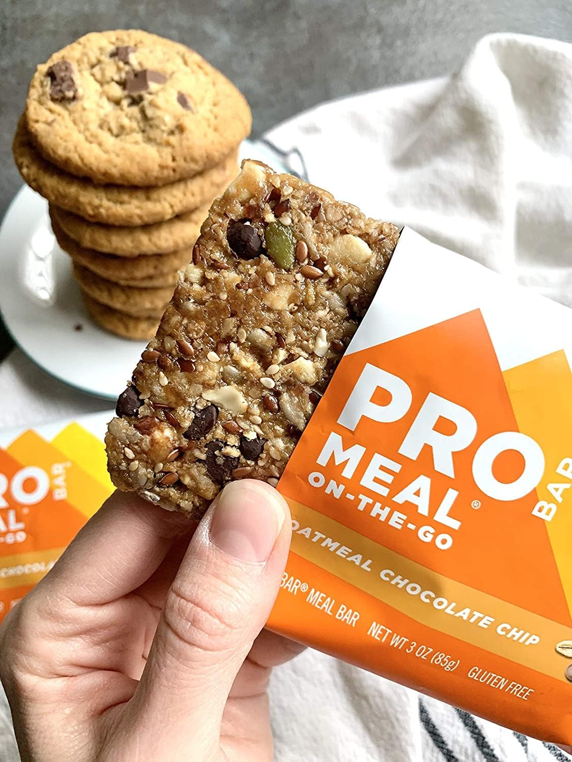 Plant-based meal replacement bar with whole food ingredients, oats, nuts, and seeds