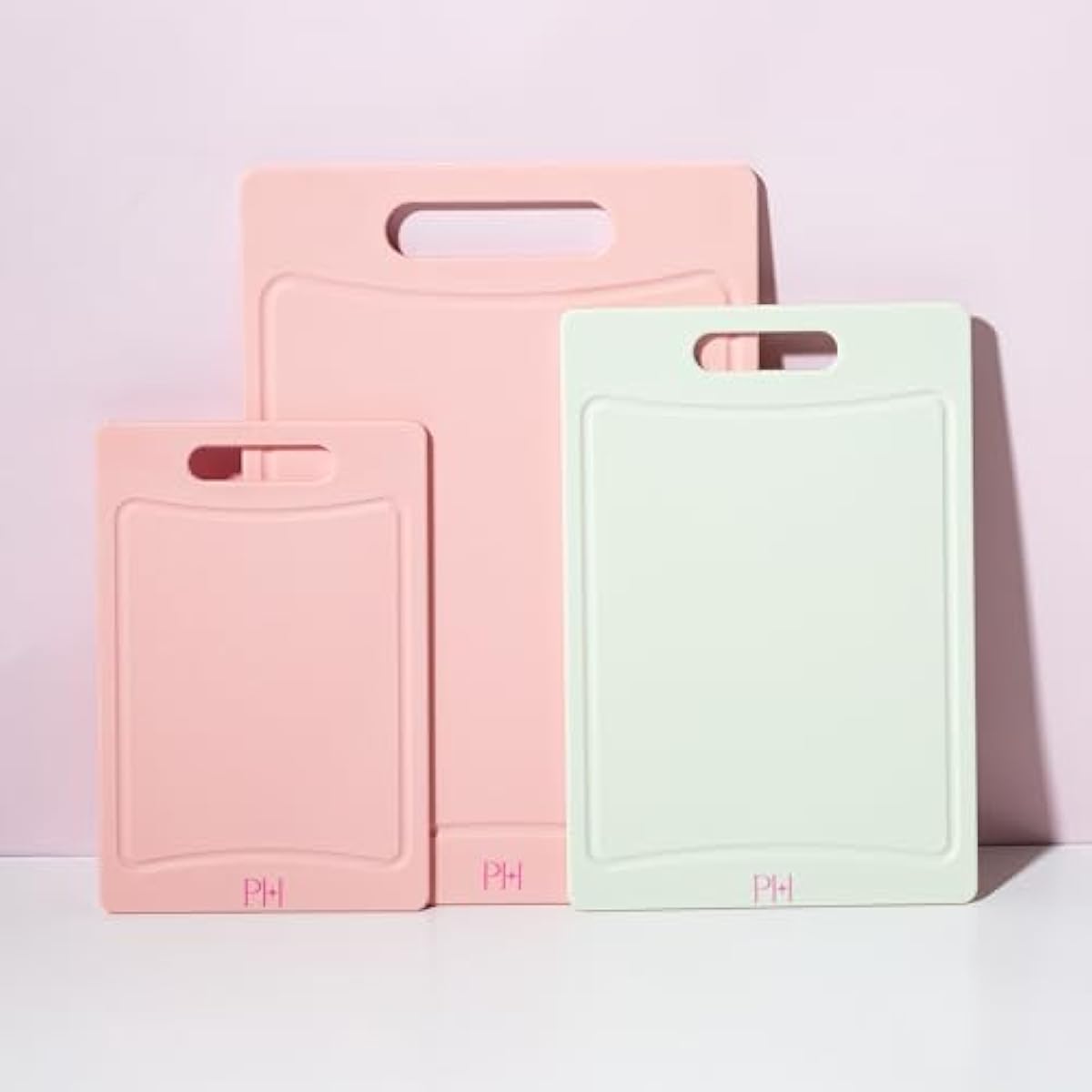 Paris Hilton Cutting Boards, Dual-Sided Cutting Board Set with Built-in Juice Grooves, Easy-Grip Handles, Heavy-Duty Plastic Made without BPA, Dishwasher Safe, 3-Piece Set, Pink and Cream