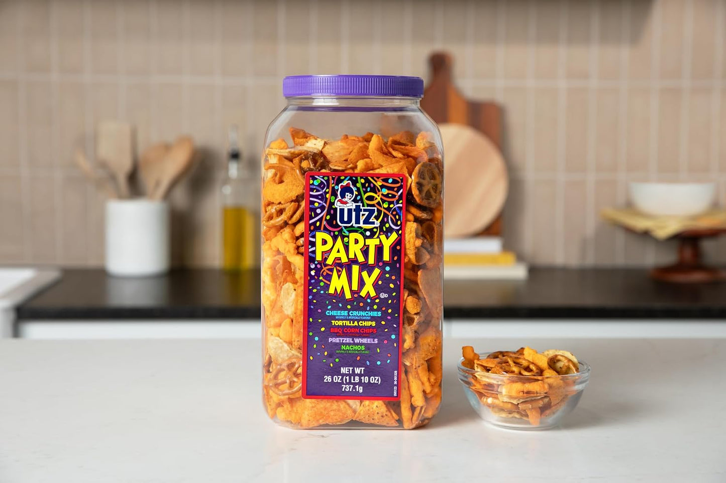 Utz Party Mix snack mix includes corn tortillas, pretzels, and cheese curls, 1.62 pounds, resealable container